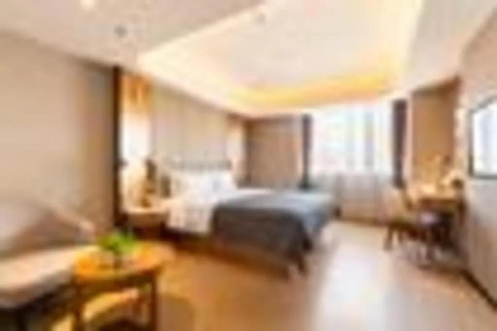 Bed in Yitel Collection Shenyang Hunnan Olympic Sports Center Caixia Street Metro Station