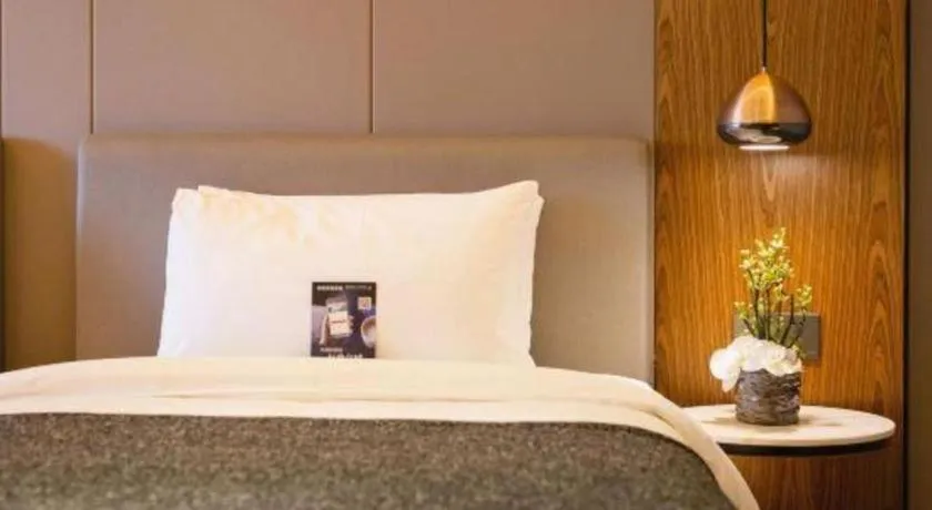 Bed in Yitel Collection Shenyang Hunnan Olympic Sports Center Caixia Street Metro Station