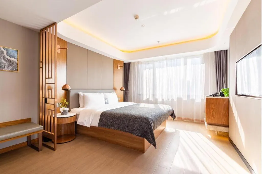 Bed in Yitel Collection Shenyang Hunnan Olympic Sports Center Caixia Street Metro Station