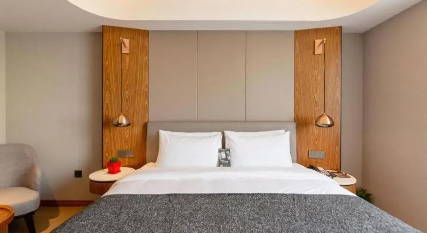 Bed in Yitel Collection Shenyang Hunnan Olympic Sports Center Caixia Street Metro Station