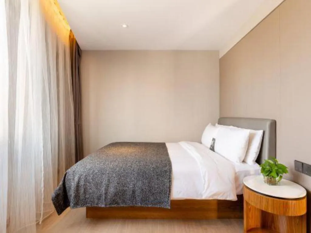 Bed in Yitel Collection Shenyang Hunnan Olympic Sports Center Caixia Street Metro Station