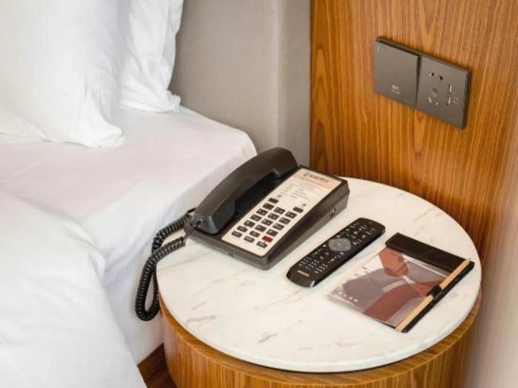 Bed in Yitel Collection Shenyang Hunnan Olympic Sports Center Caixia Street Metro Station