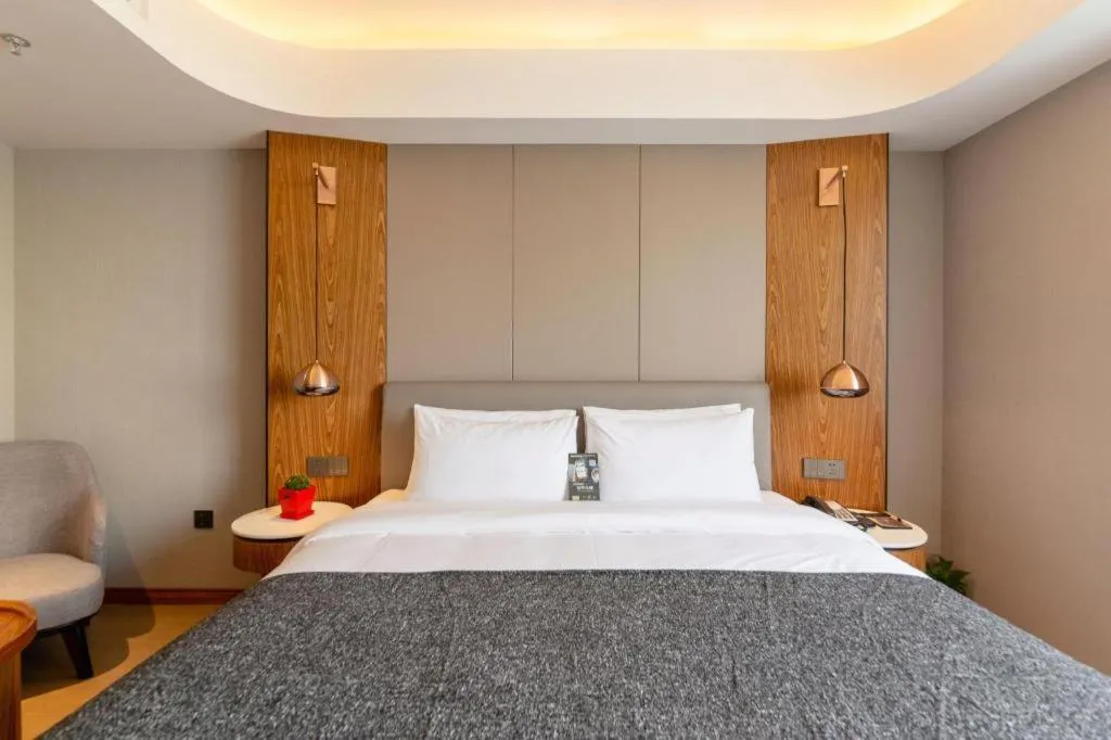 Bed in Yitel Collection Shenyang Hunnan Olympic Sports Center Caixia Street Metro Station