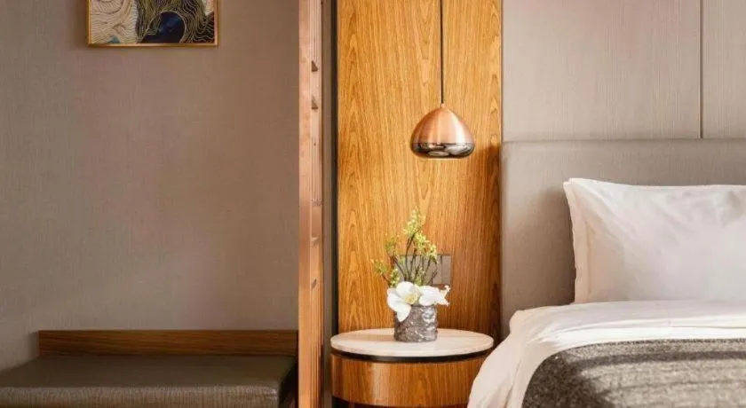 Bed in Yitel Collection Shenyang Hunnan Olympic Sports Center Caixia Street Metro Station