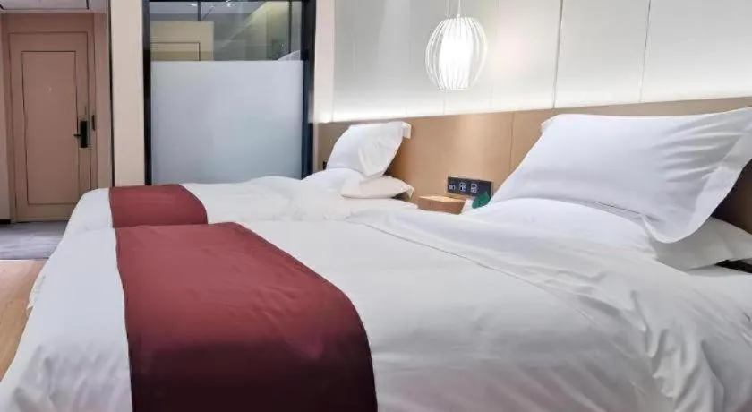 Bed in Gya Hotel Jurong England International