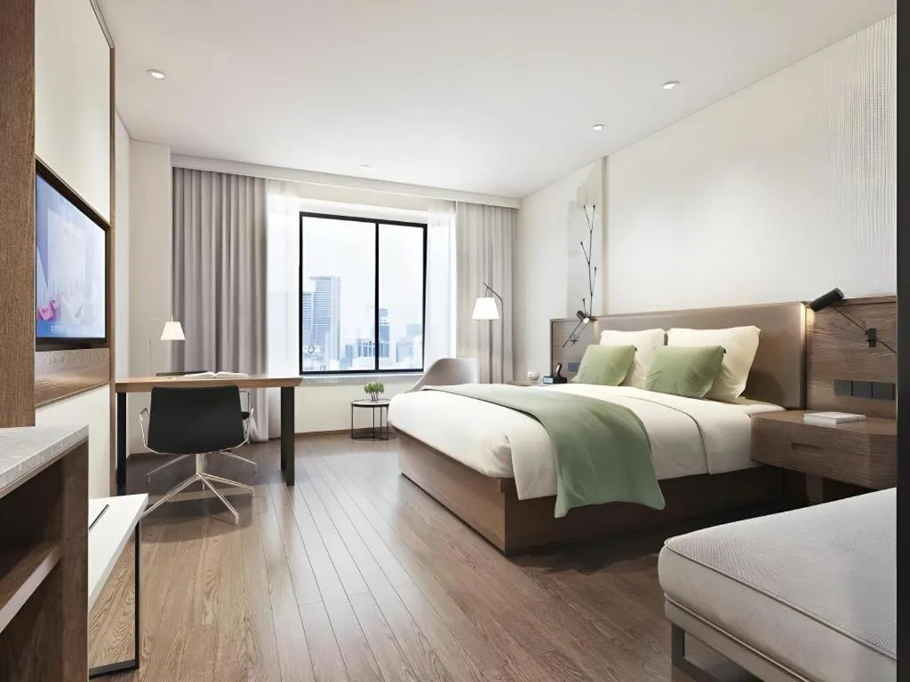 Bed in GreenTree Inn Ganzhou Gan County Bus Station