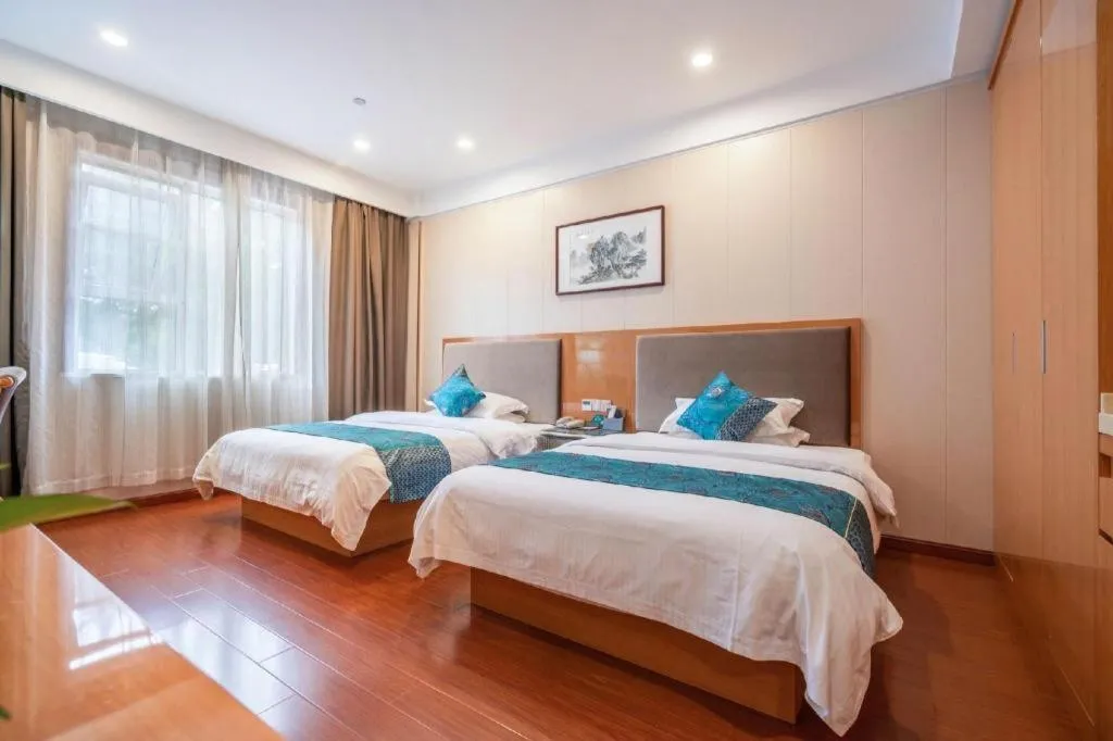 Bed in GreenTree Inn Wuxi Xinwu District Meicun Town Taibo Avenue