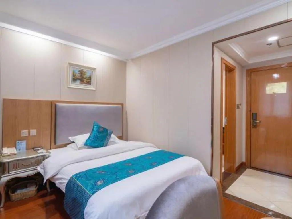 Bed in GreenTree Inn Wuxi Xinwu District Meicun Town Taibo Avenue