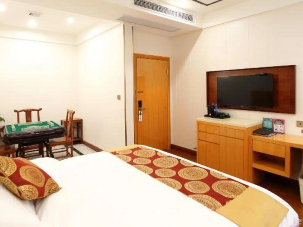 Bed in GreenTree Inn Wuxi Xinwu District Meicun Town Taibo Avenue