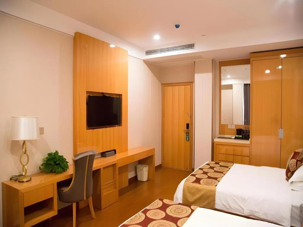 Bed in GreenTree Inn Wuxi Xinwu District Meicun Town Taibo Avenue