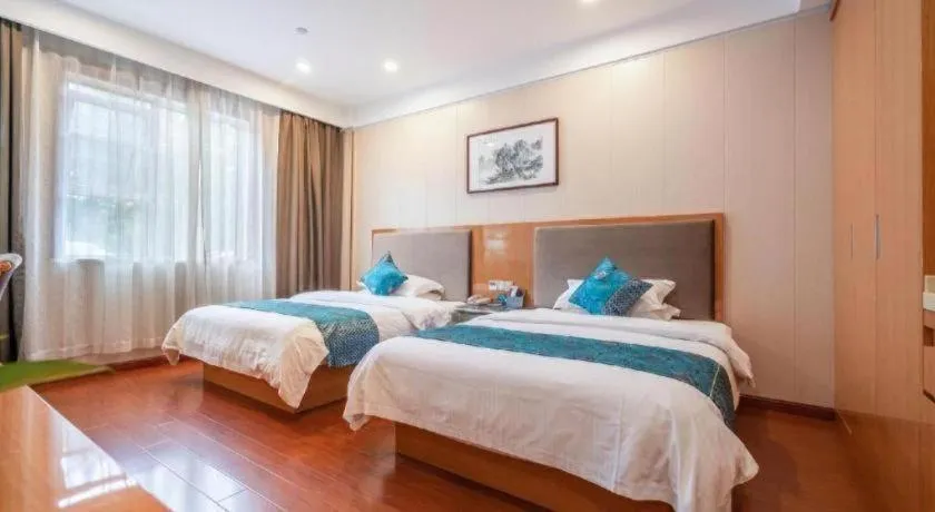 Bed in GreenTree Inn Wuxi Xinwu District Meicun Town Taibo Avenue
