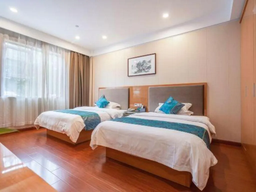 Bed in GreenTree Inn Wuxi Xinwu District Meicun Town Taibo Avenue