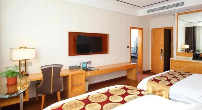 Bed in GreenTree Inn Wuxi Xinwu District Meicun Town Taibo Avenue