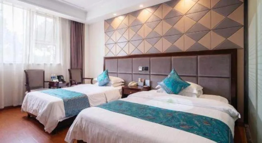 Bed in GreenTree Inn Wuxi Xinwu District Meicun Town Taibo Avenue