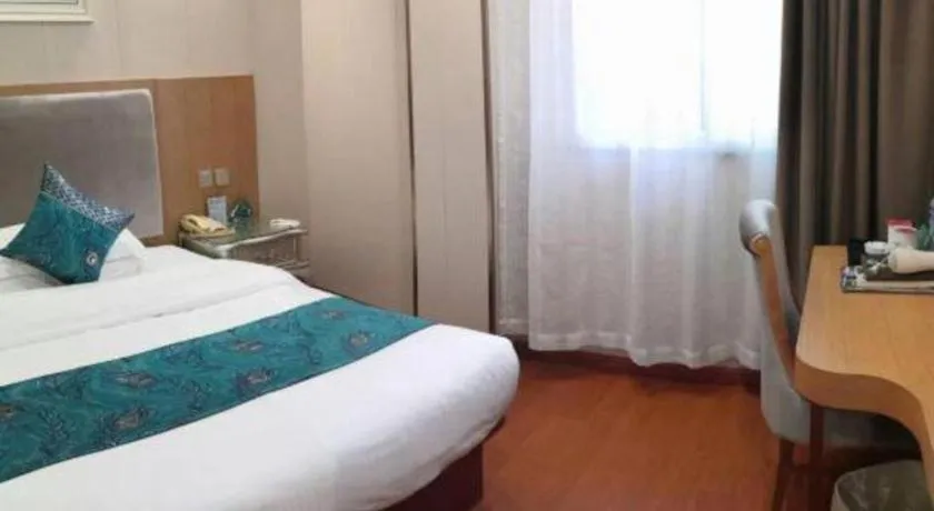 Bed in GreenTree Inn Wuxi Xinwu District Meicun Town Taibo Avenue