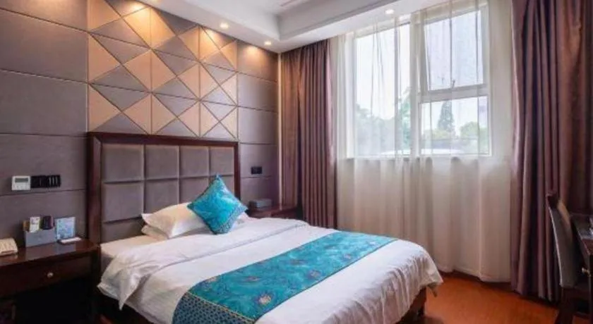 Bed in GreenTree Inn Wuxi Xinwu District Meicun Town Taibo Avenue