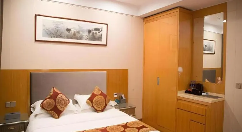Bed in GreenTree Inn Wuxi Xinwu District Meicun Town Taibo Avenue