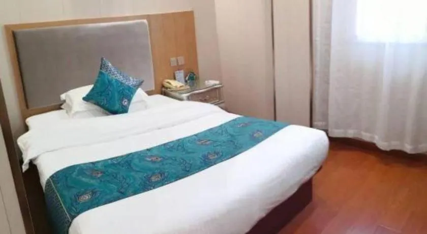 Bed in GreenTree Inn Wuxi Xinwu District Meicun Town Taibo Avenue