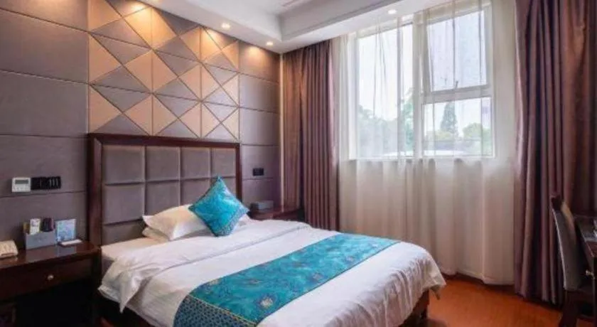 Bed in GreenTree Inn Wuxi Xinwu District Meicun Town Taibo Avenue