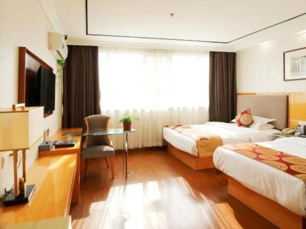 Bed in GreenTree Inn Wuxi Xinwu District Meicun Town Taibo Avenue