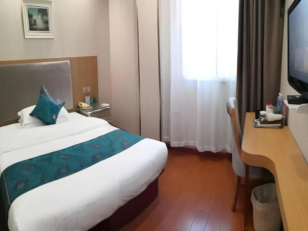 Bed in GreenTree Inn Wuxi Xinwu District Meicun Town Taibo Avenue