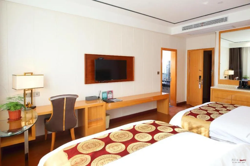 Bed in GreenTree Inn Wuxi Xinwu District Meicun Town Taibo Avenue