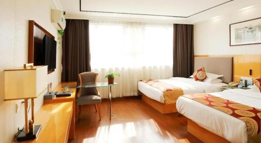 Bed in GreenTree Inn Wuxi Xinwu District Meicun Town Taibo Avenue