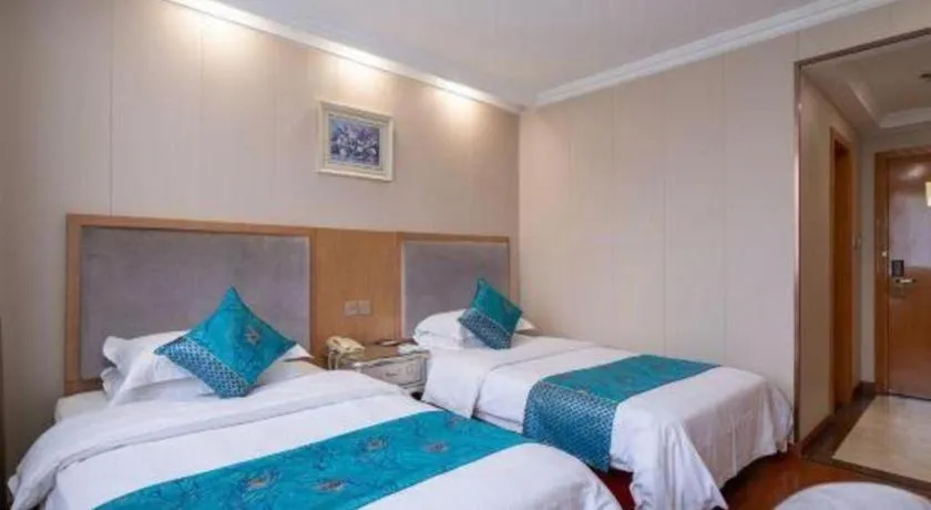 Bed in GreenTree Inn Wuxi Xinwu District Meicun Town Taibo Avenue