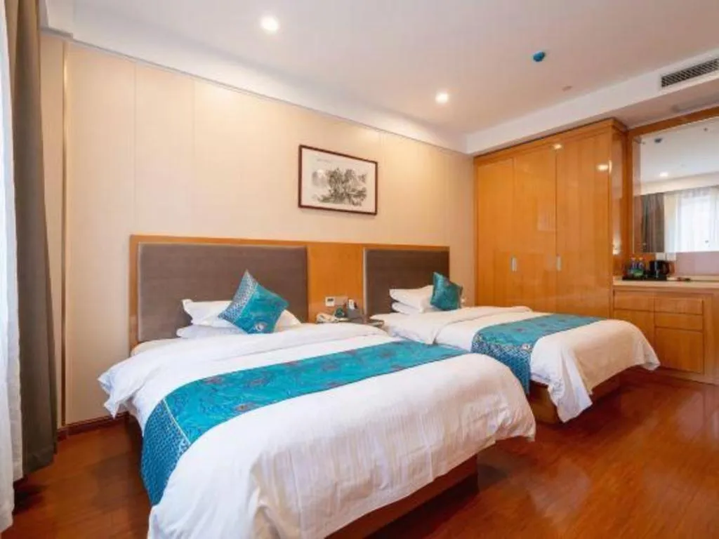 Bed in GreenTree Inn Wuxi Xinwu District Meicun Town Taibo Avenue