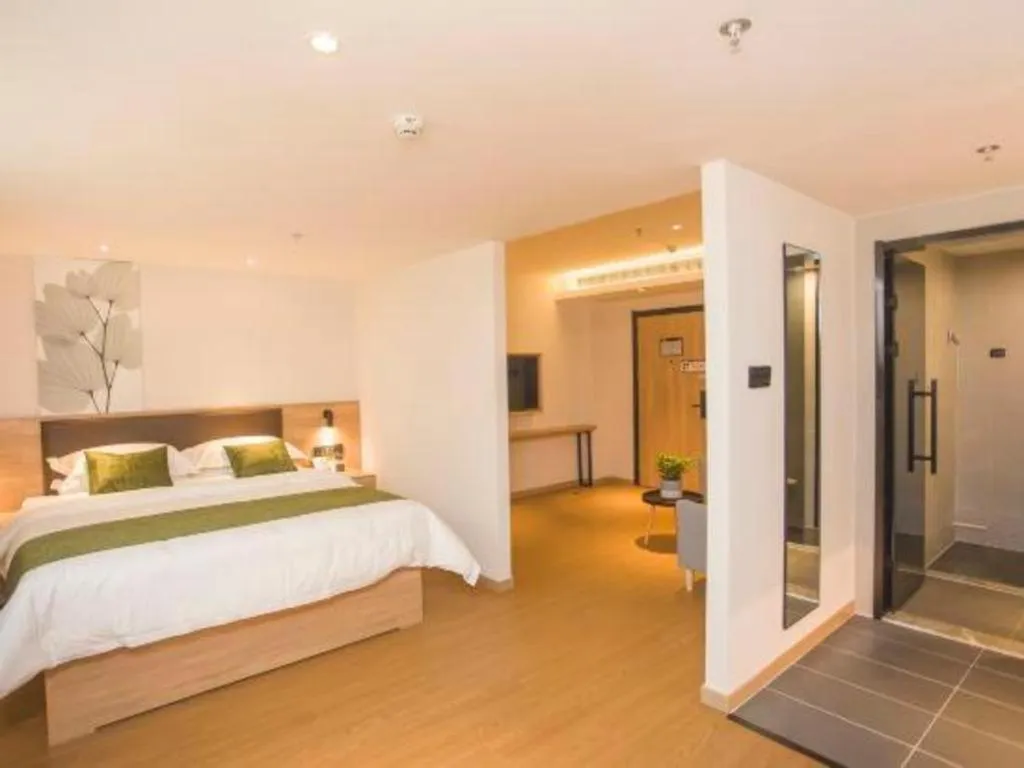 Bed in GreenTree Inn Express Taizhou Jiangyan Hardware City