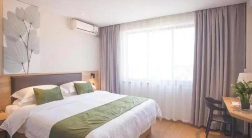 Bed in GreenTree Inn Express Taizhou Jiangyan Hardware City