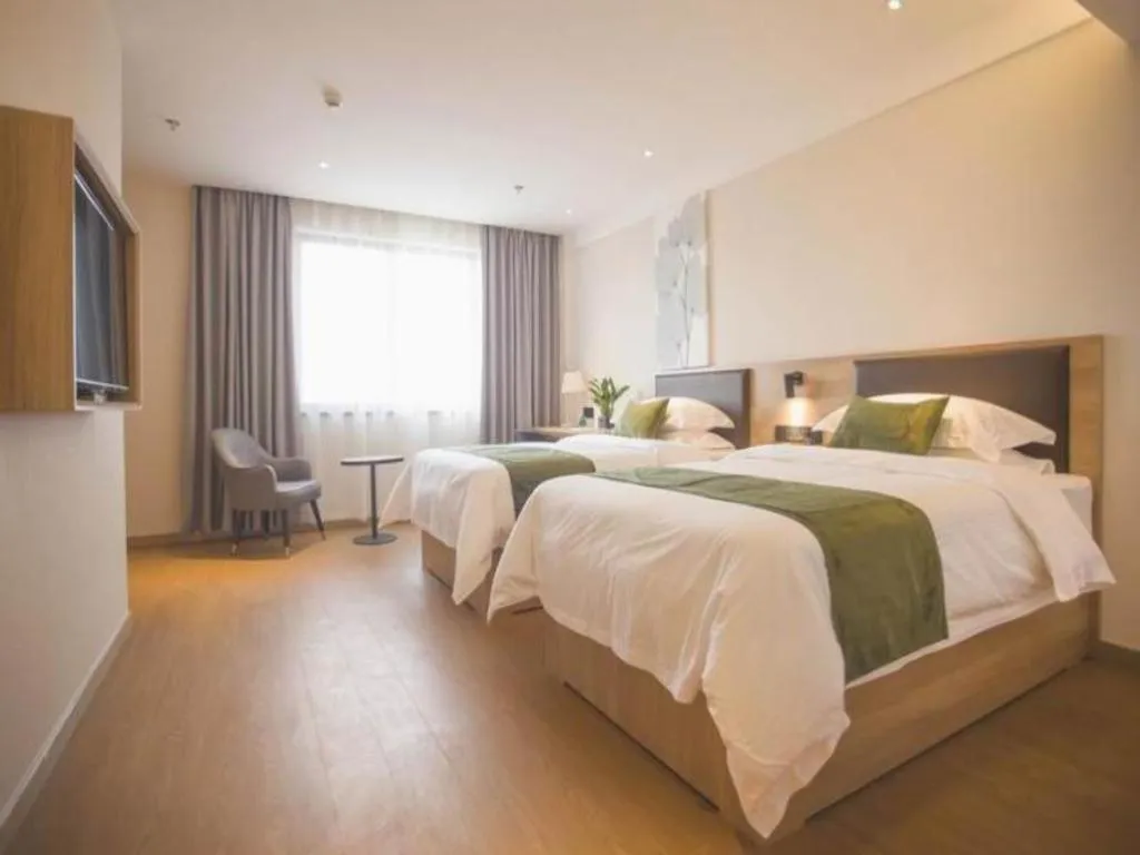 Bed in GreenTree Inn Express Taizhou Jiangyan Hardware City