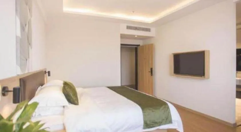 Bed in GreenTree Inn Express Taizhou Jiangyan Hardware City