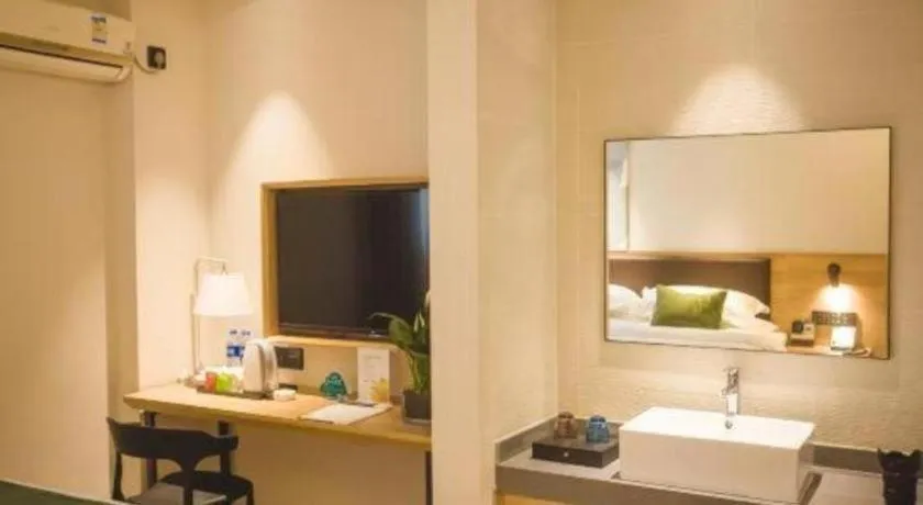 Bed in GreenTree Inn Express Taizhou Jiangyan Hardware City