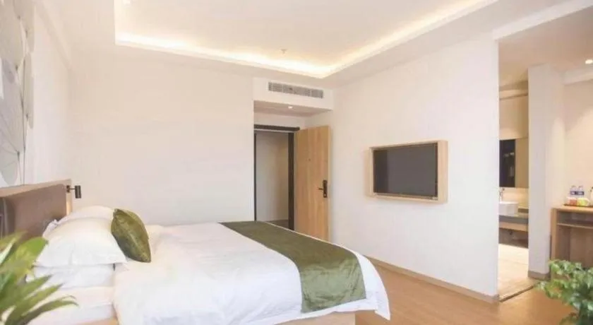 Bed in GreenTree Inn Express Taizhou Jiangyan Hardware City