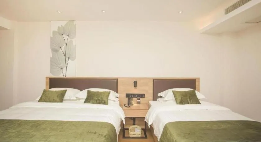 Bed in GreenTree Inn Express Taizhou Jiangyan Hardware City