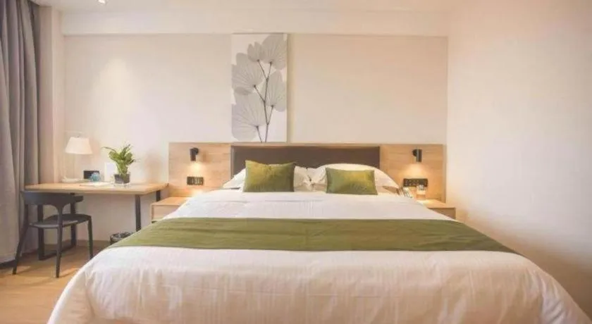 Bed in GreenTree Inn Express Taizhou Jiangyan Hardware City