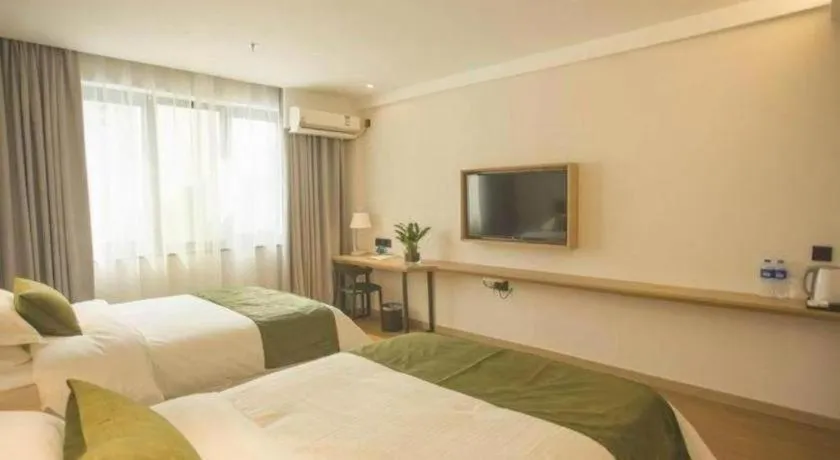Bed in GreenTree Inn Express Taizhou Jiangyan Hardware City