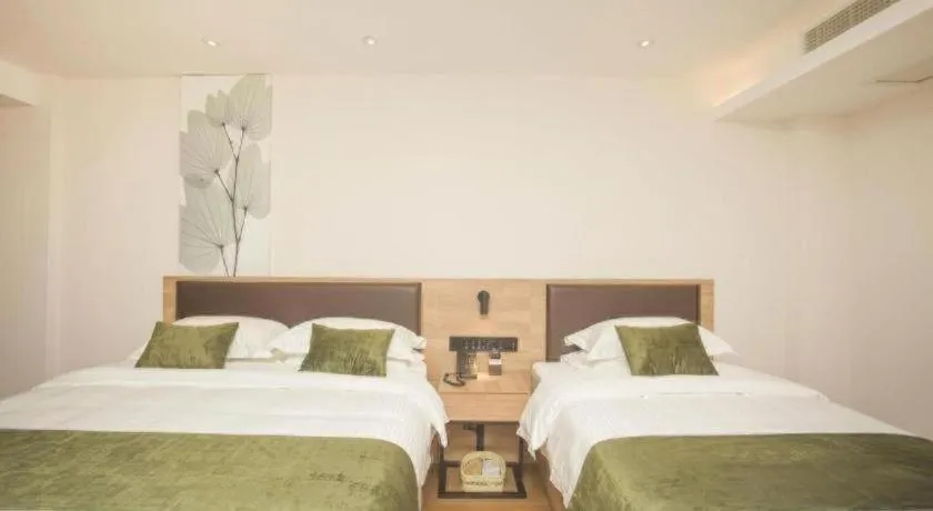 Bed in GreenTree Inn Express Taizhou Jiangyan Hardware City