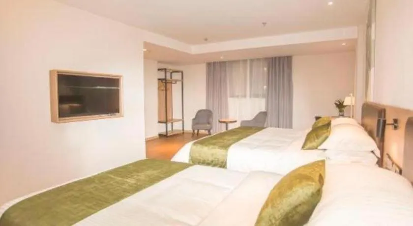 Bed in GreenTree Inn Express Taizhou Jiangyan Hardware City