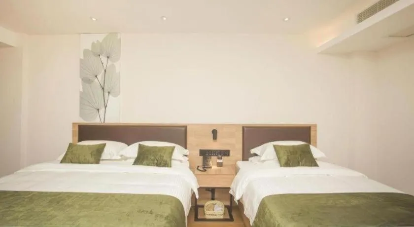 Bed in GreenTree Inn Express Taizhou Jiangyan Hardware City