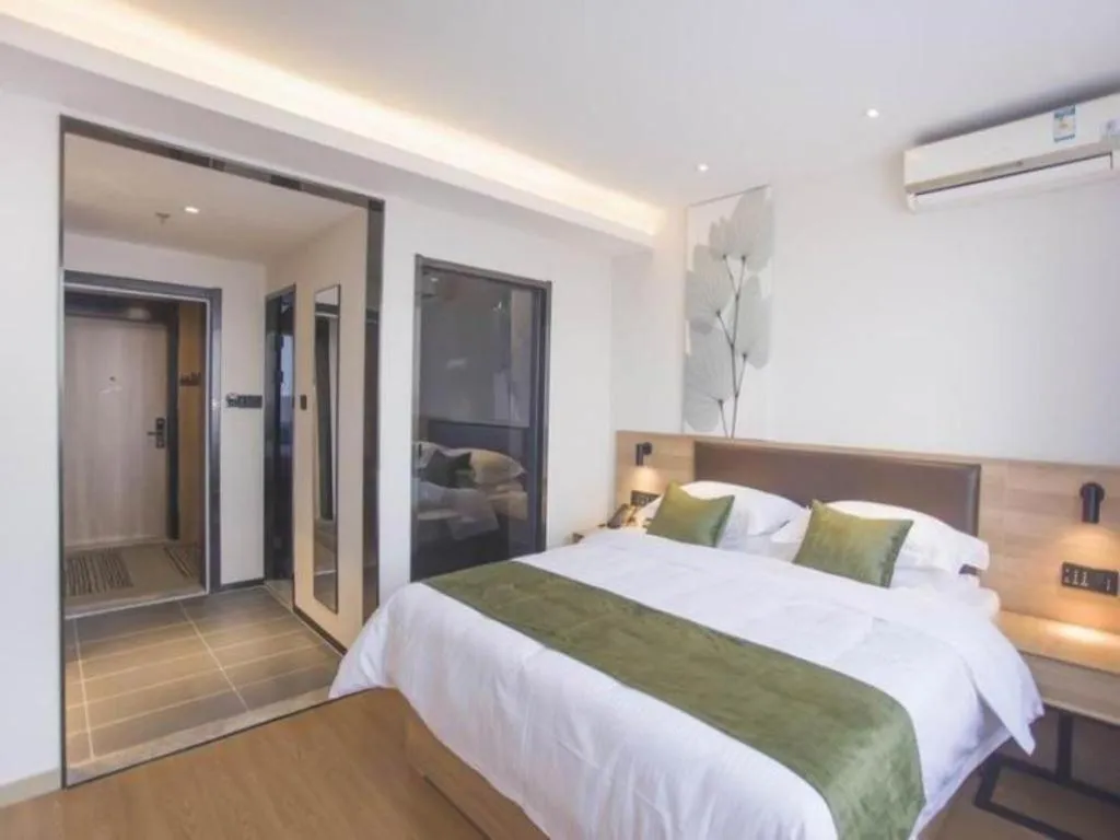 Bed in GreenTree Inn Express Taizhou Jiangyan Hardware City