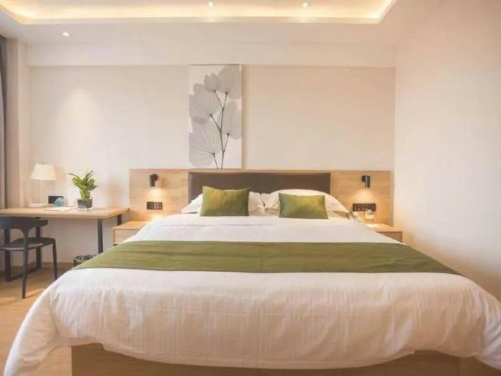 Bed in GreenTree Inn Express Taizhou Jiangyan Hardware City