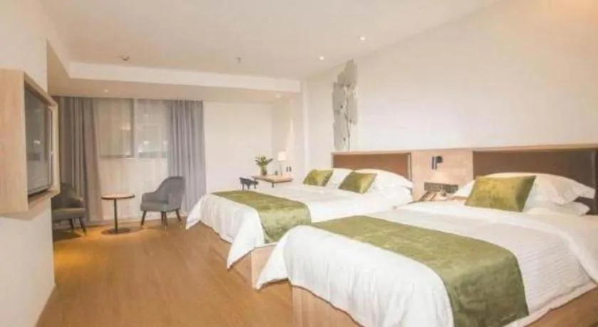 Bed in GreenTree Inn Express Taizhou Jiangyan Hardware City