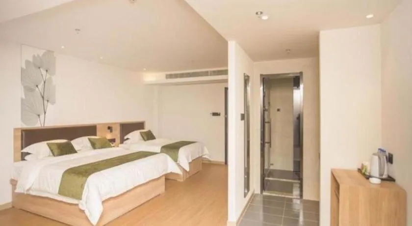 Bed in GreenTree Inn Express Taizhou Jiangyan Hardware City