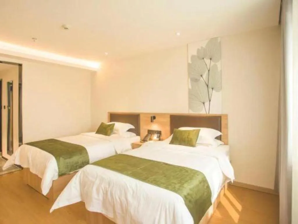 Bed in GreenTree Inn Express Taizhou Jiangyan Hardware City