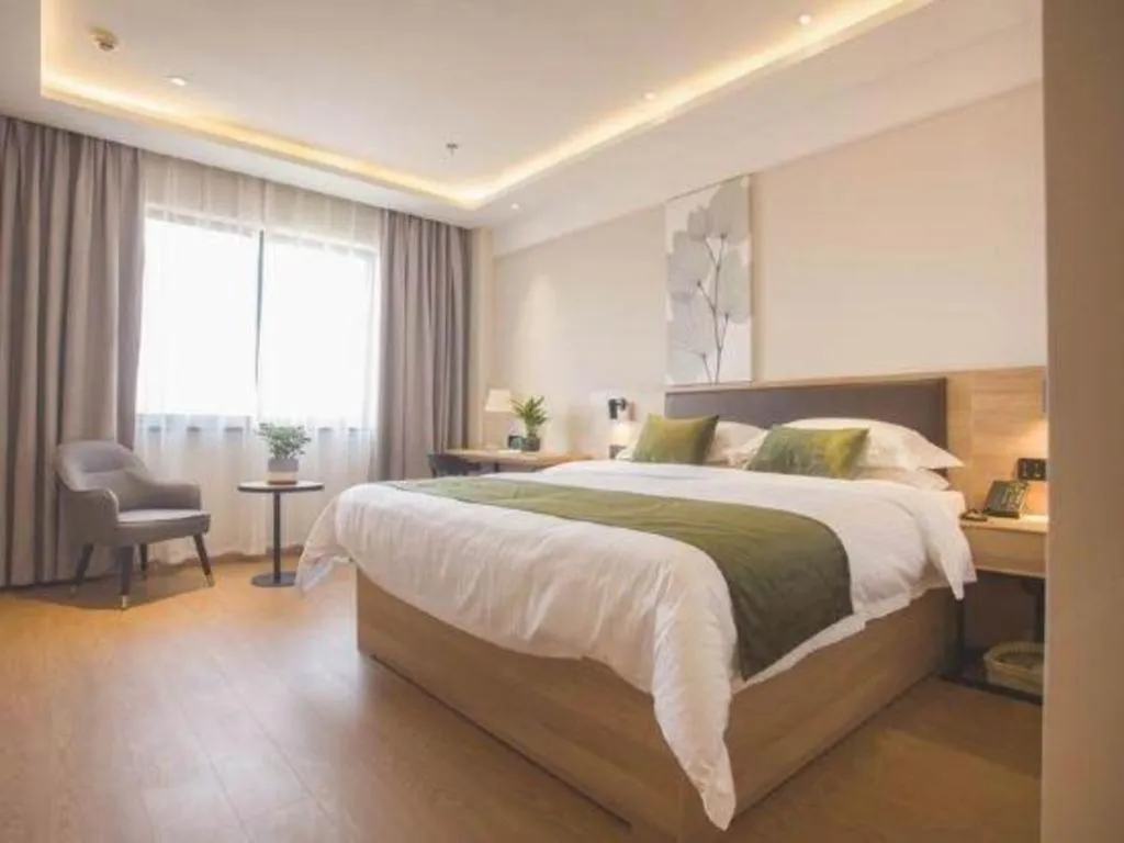 Bed in GreenTree Inn Express Taizhou Jiangyan Hardware City