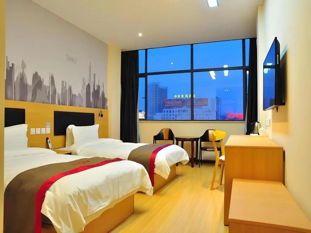 Bed in Thank Hotel Jiangxi Jiujiang Lianxi District Railway Station Square