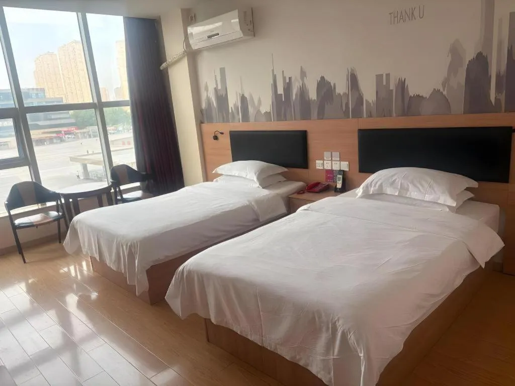 Bed in Thank Hotel Jiangxi Jiujiang Lianxi District Railway Station Square
