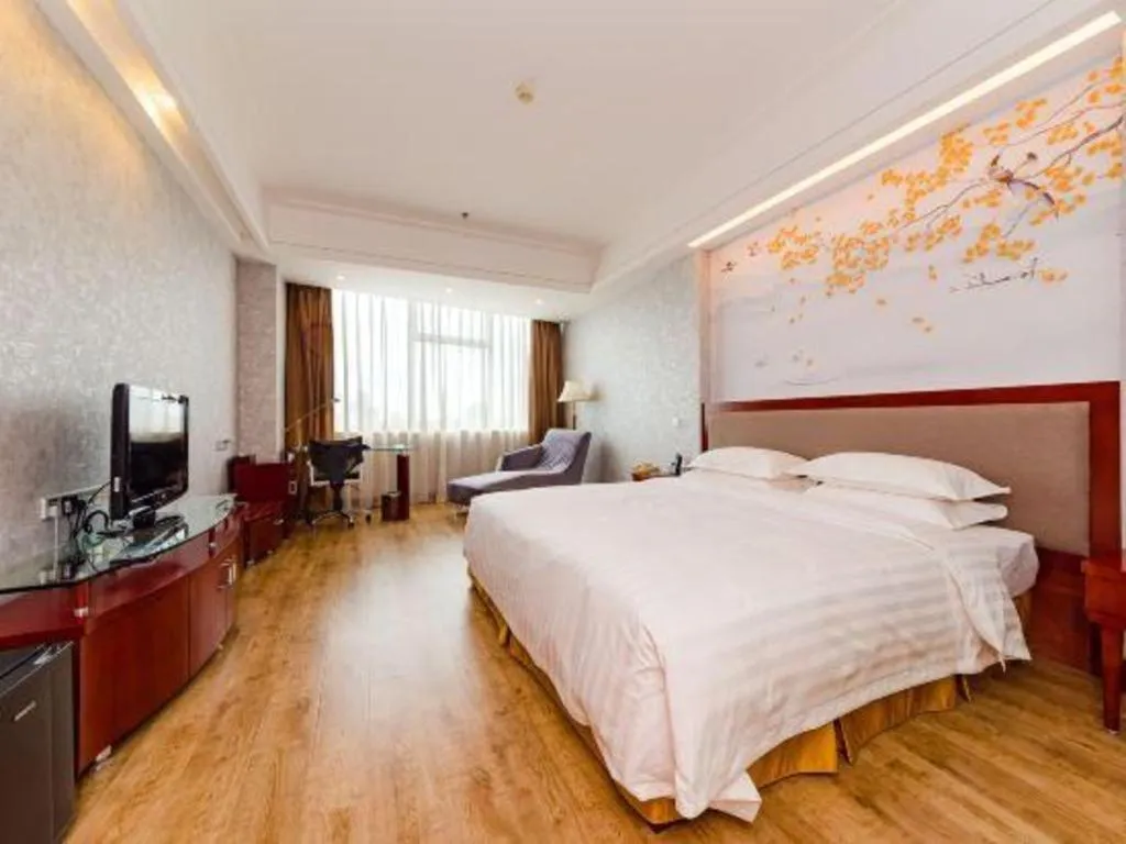 Bed in Junyu Grand Hotel Qinhuangdao
